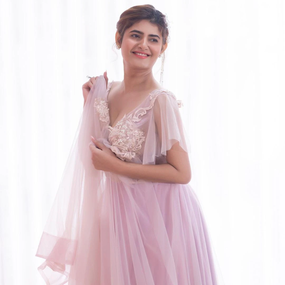 tollywood actress Ashima Narwal photos in pink dress