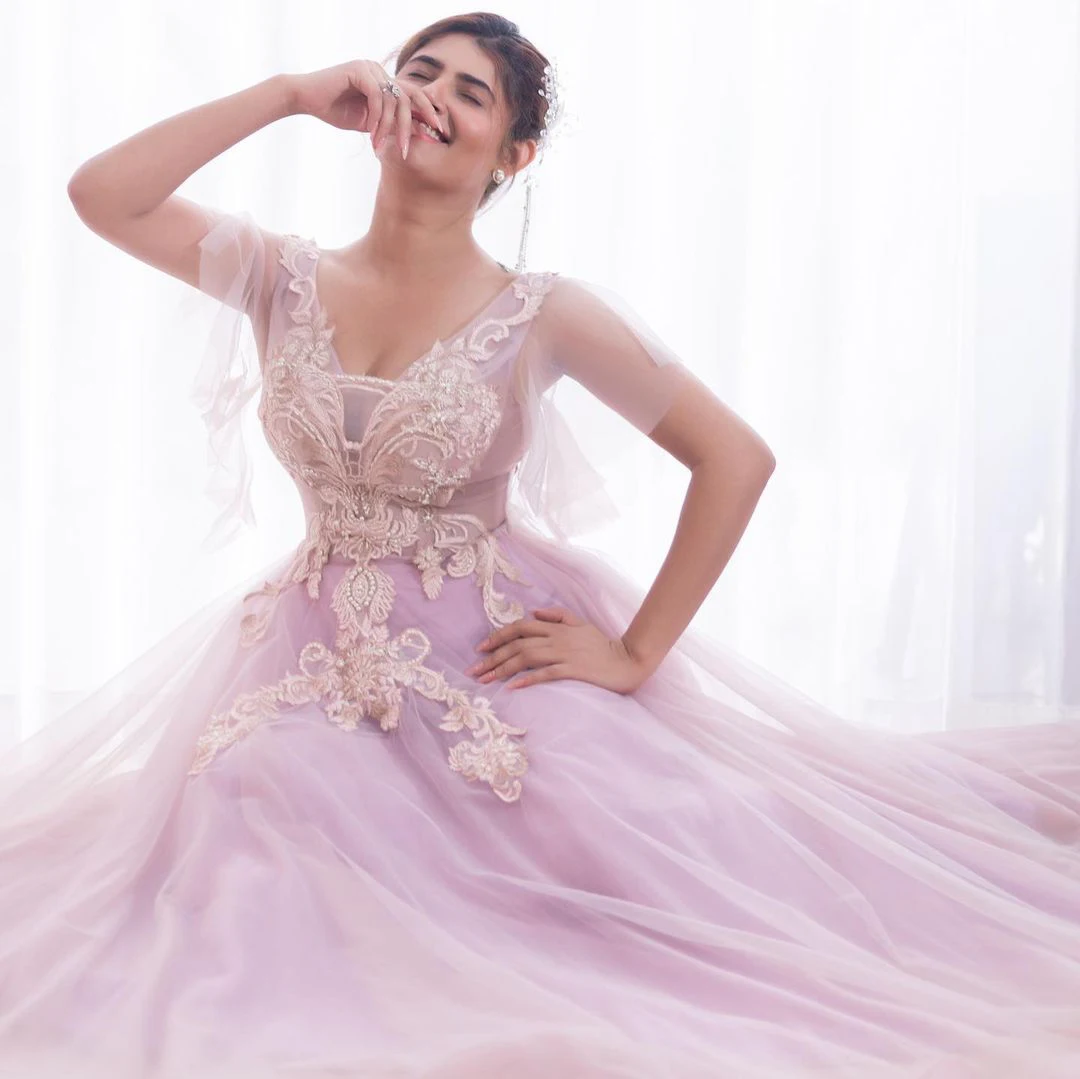 tollywood actress Ashima Narwal photos in pink dress
