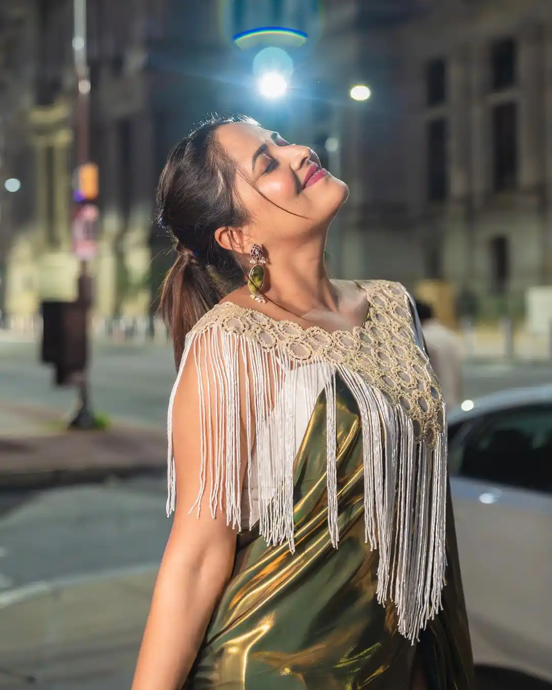 Anchor Anasuya Shines in Golden Saree at America