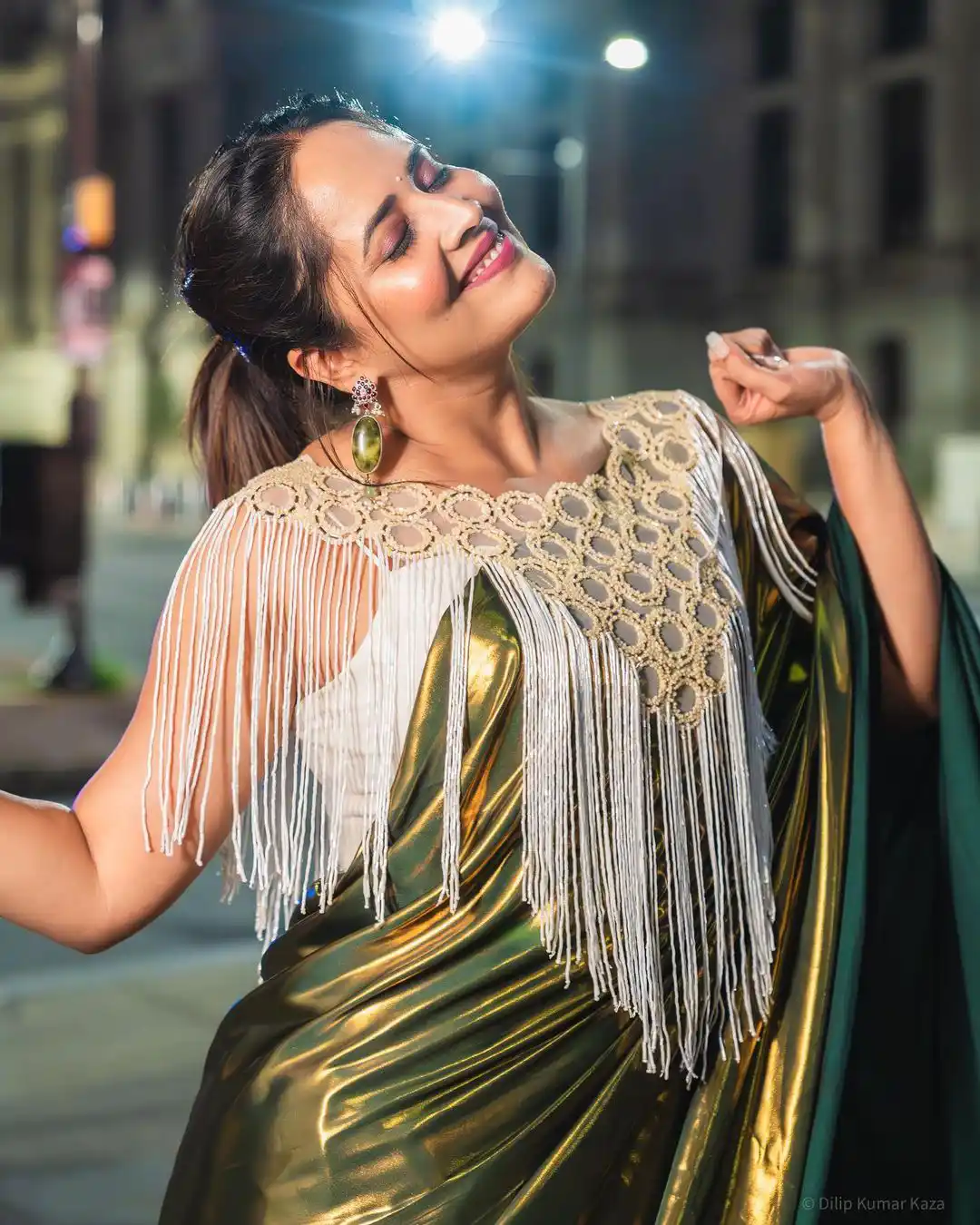 Anchor Anasuya Shines in Golden Saree at America