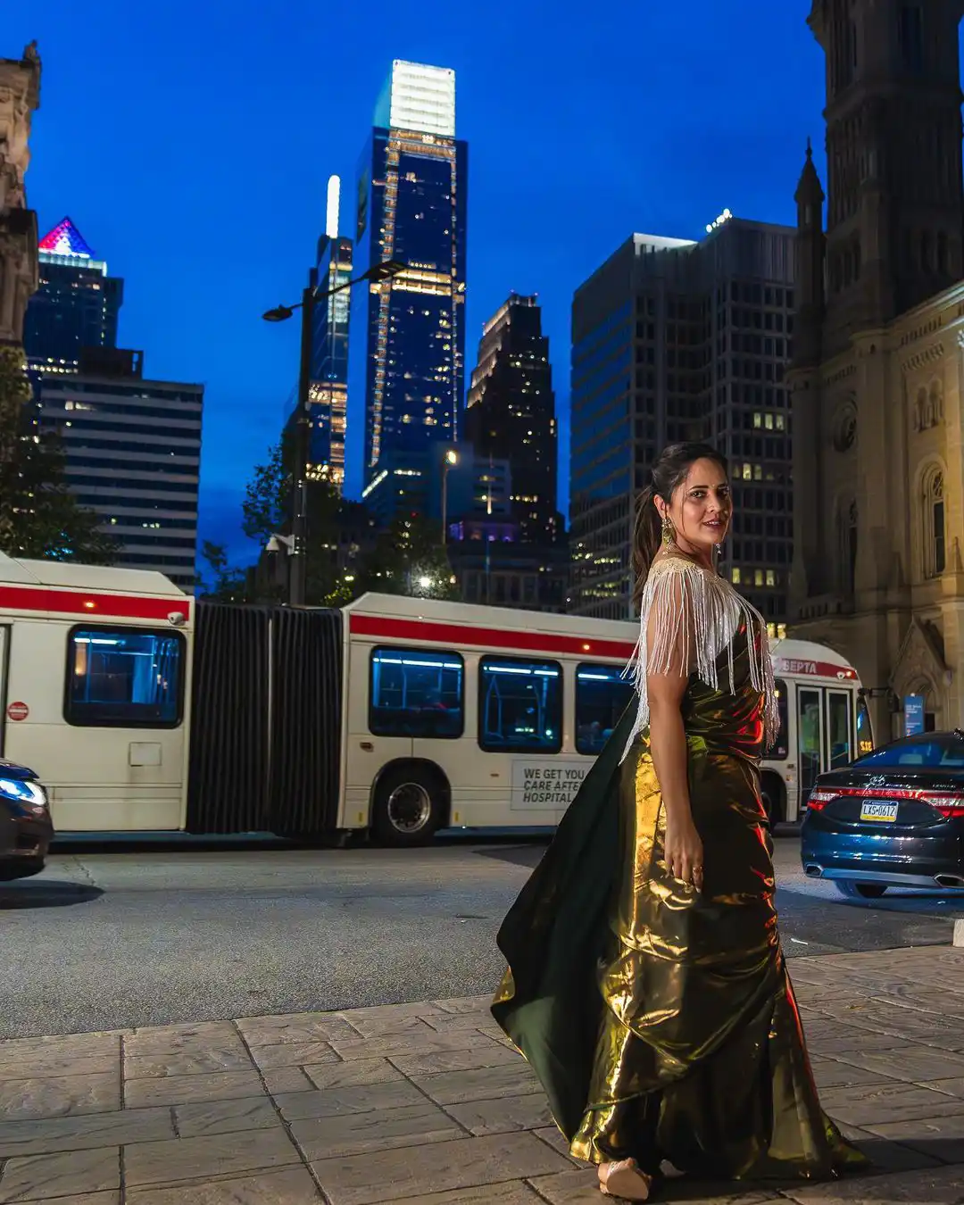 Anchor Anasuya Shines in Golden Saree at America