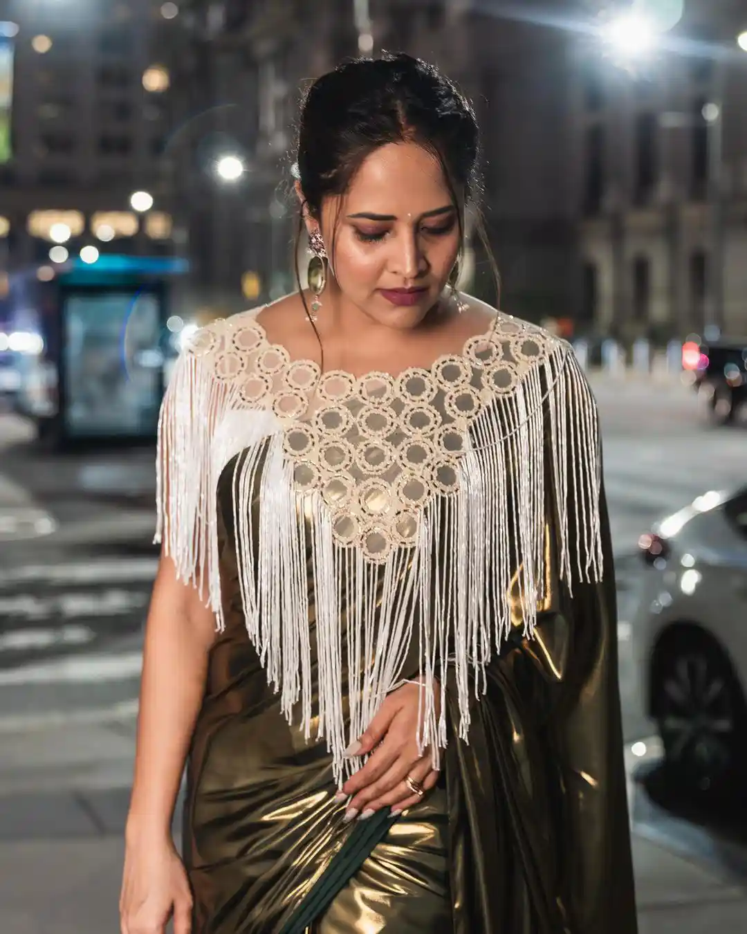 Anchor Anasuya Shines in Golden Saree at America