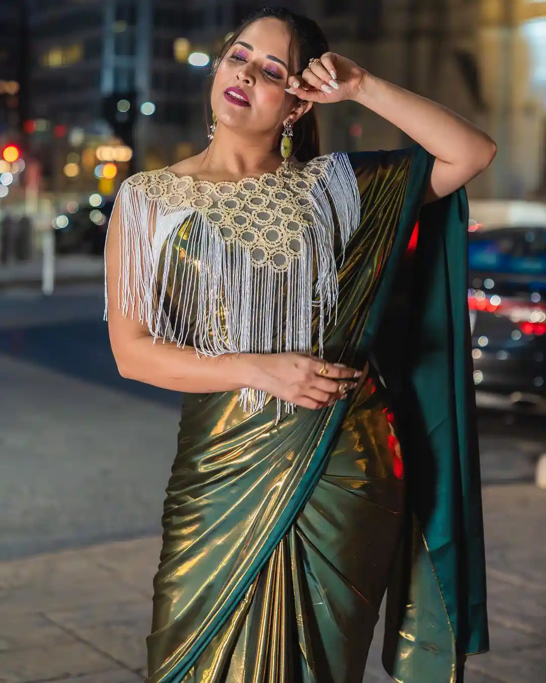 Anchor Anasuya Shines in Golden Saree at America