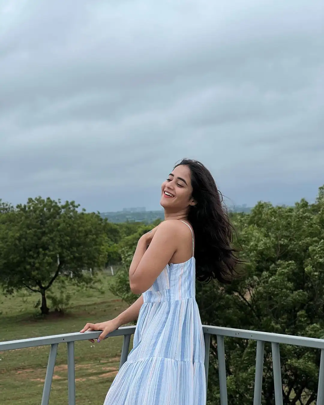 Deepthi Sunaina cute looks with Enjoying Monsoon