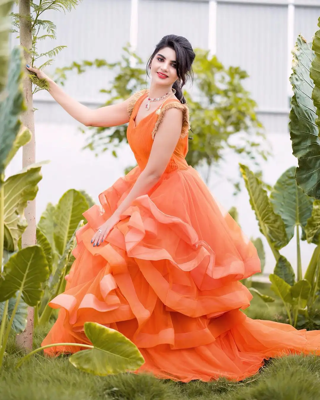 Jabardasth Varsha Photos in orange dress gone viral