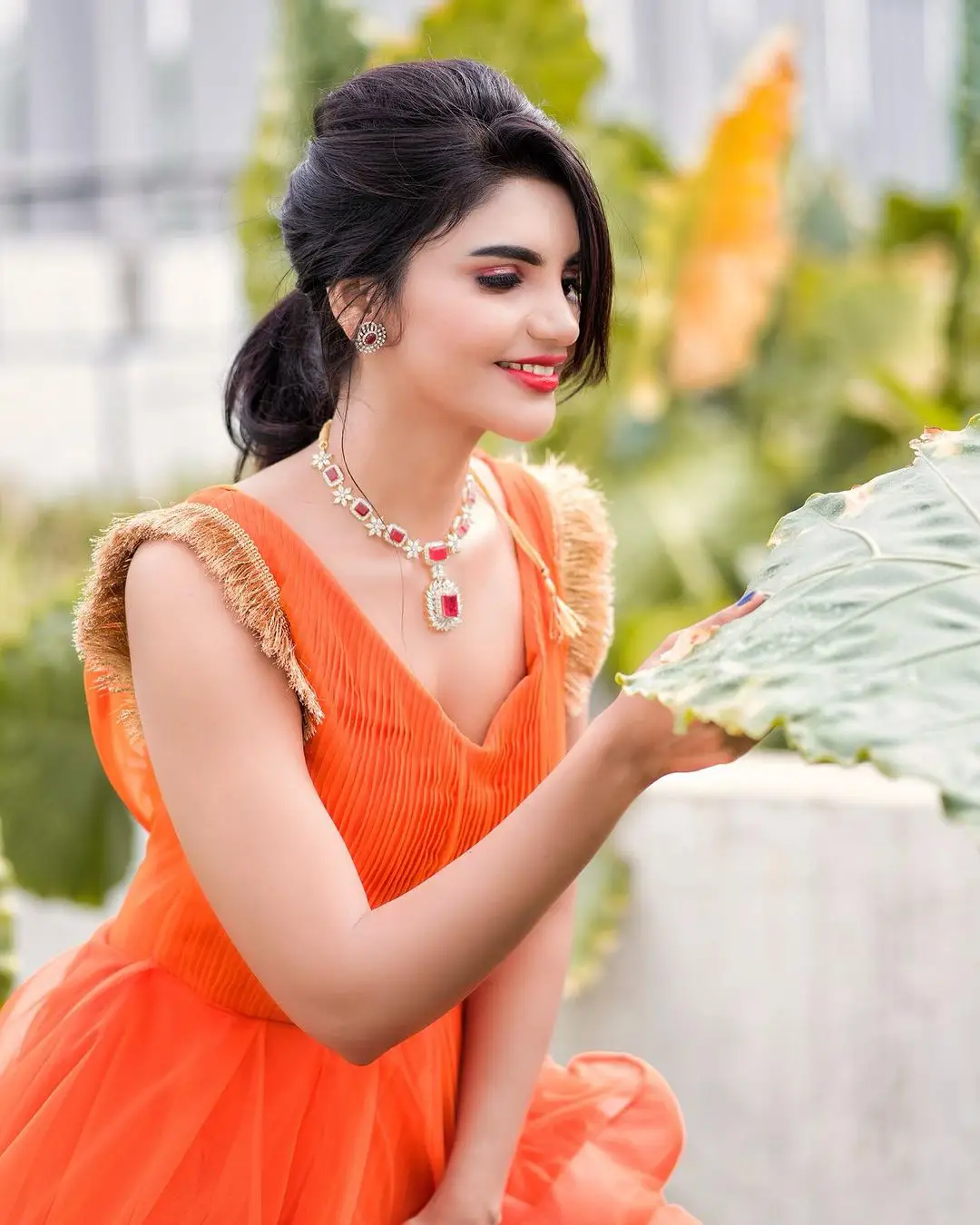 Jabardasth Varsha Photos in orange dress gone viral