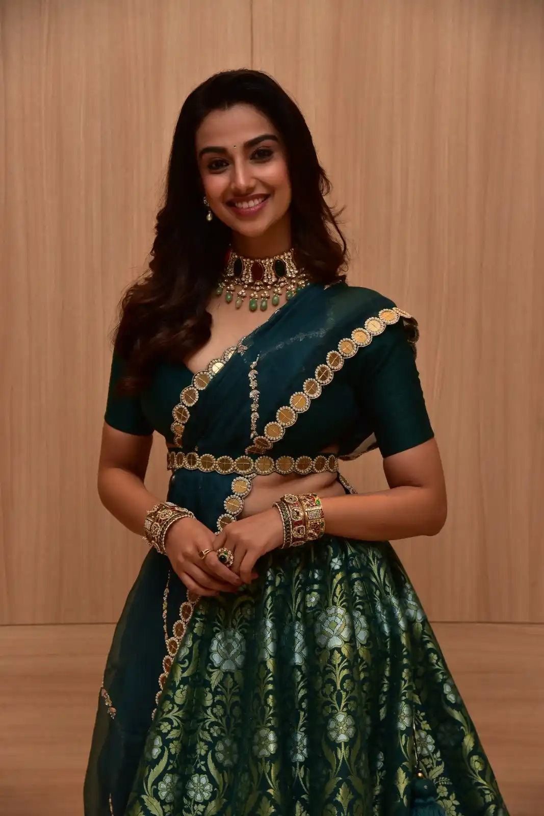Meenakshi Chaudhary latest stills in Half Saree