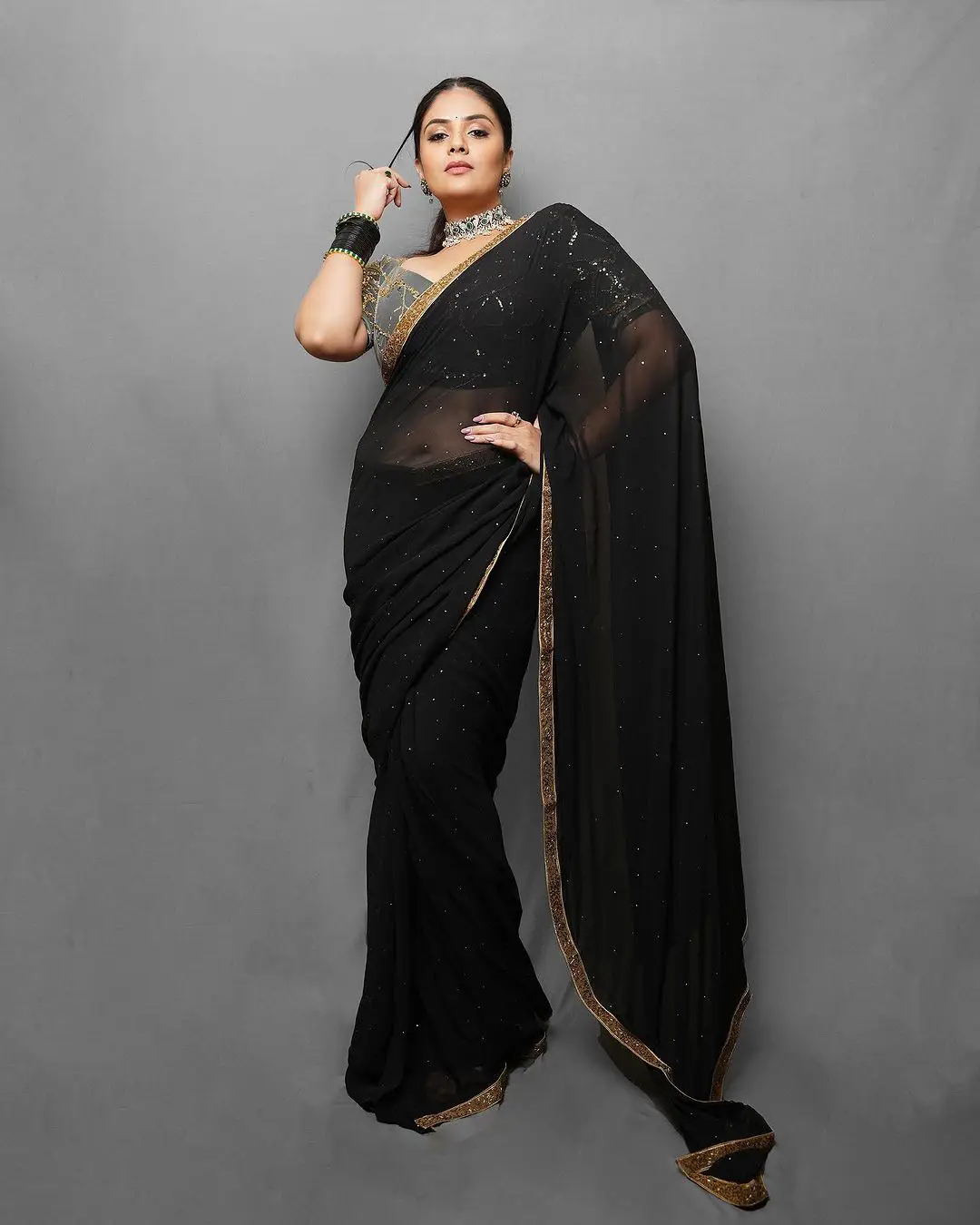 Sreemukhi Shines in Black Saree