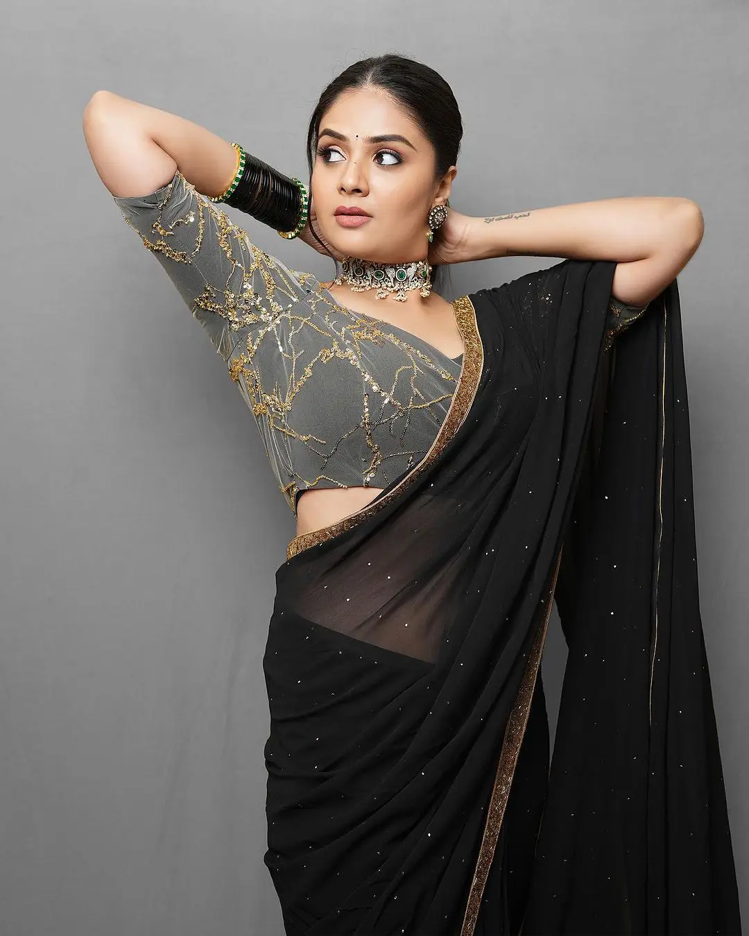 Sreemukhi Shines in Black Saree
