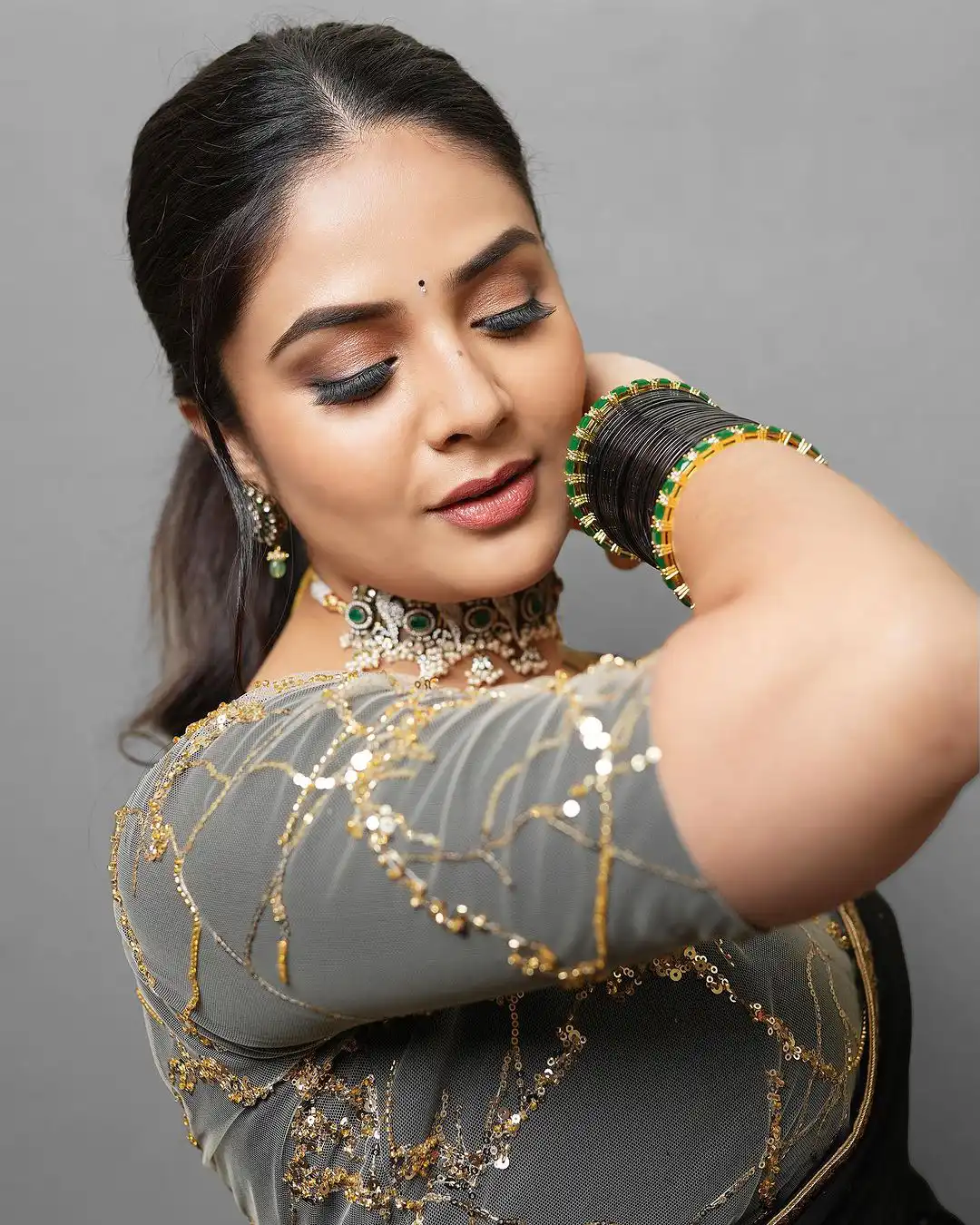 Sreemukhi Shines in Black Saree