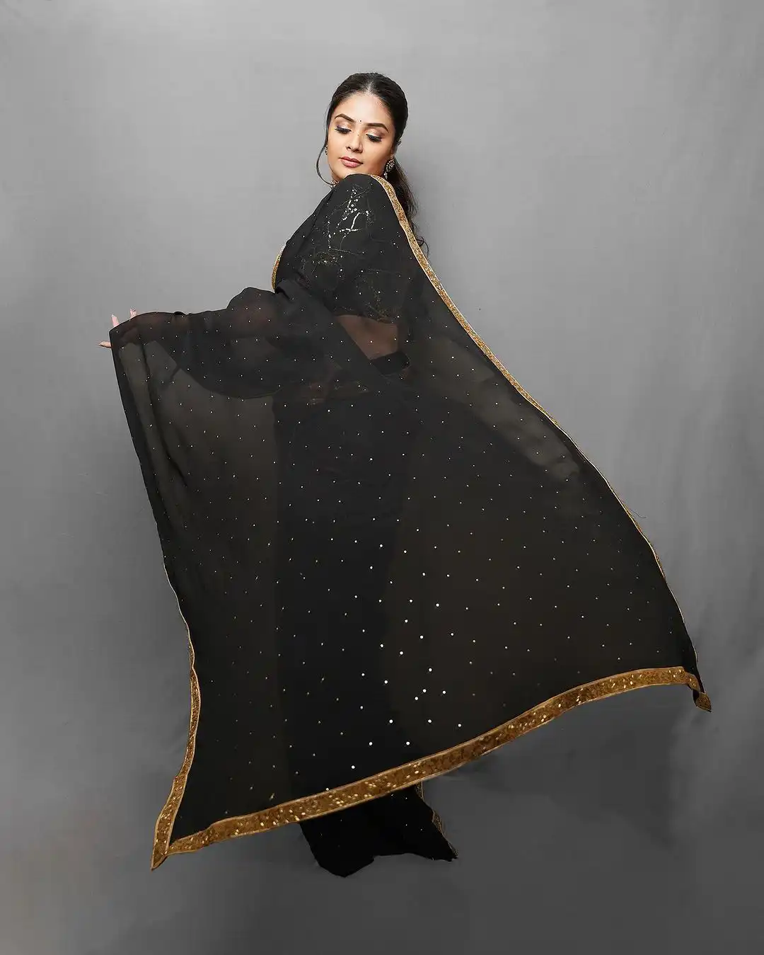 Sreemukhi Shines in Black Saree
