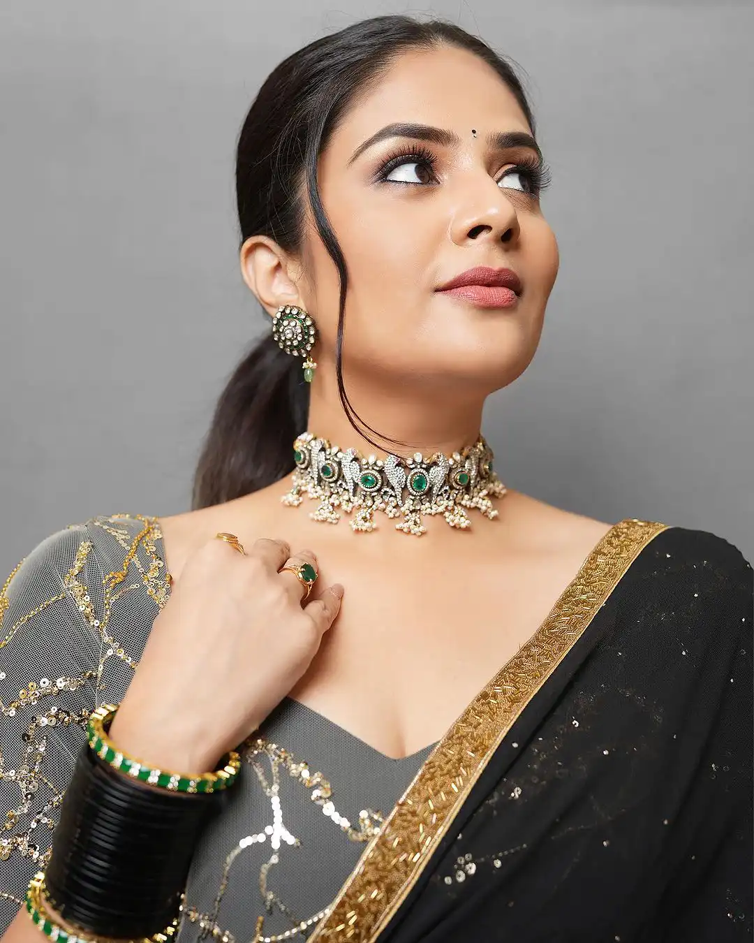 Sreemukhi Shines in Black Saree