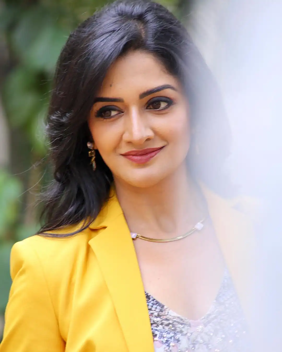 Vimala Raman stylish poses in Rudrangi Movie Promotions