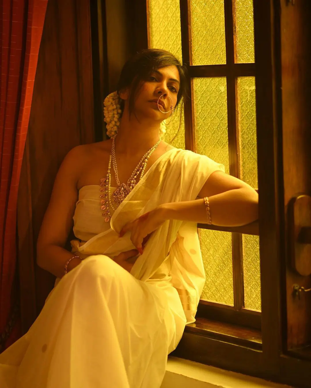 Madonna Sebastian latest saree photos on occasion of onam 2023