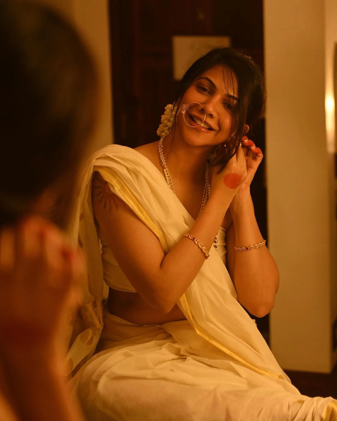 Madonna Sebastian latest saree photos on occasion of onam 2023