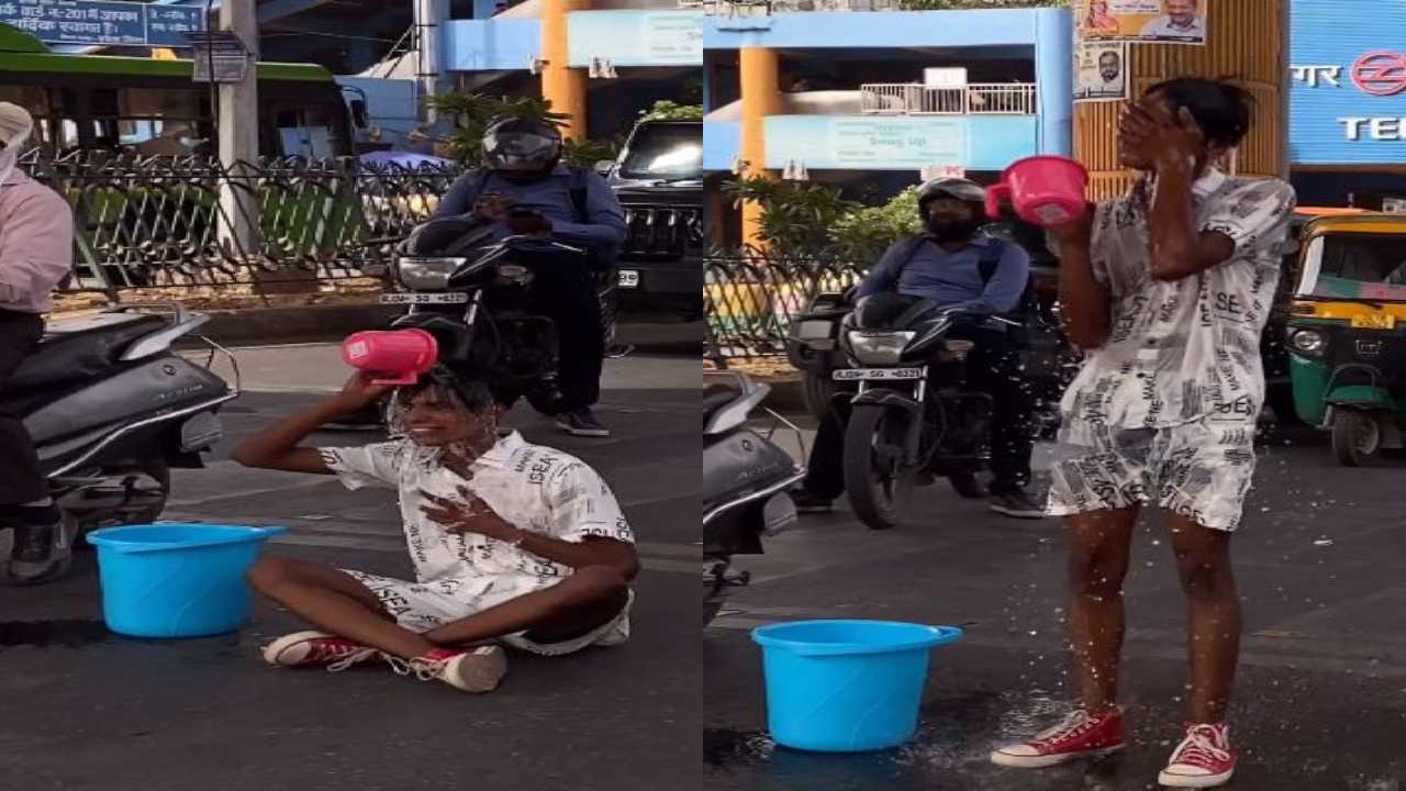 Delhi : ట్రాఫిక్ సిగ్నల్ దగ్గర రోడ్డుపై స్నానం చేసిన యువకుడు.. కఠిన చర్యలు తీసుకోవాలంటున్న నెటిజన్లు Delhi : ట్రాఫిక్ సిగ్నల్ దగ్గర రోడ్డుపై స్నానం చేసిన యువకుడు.. కఠిన చర్యలు తీసుకోవాలంటున్న నెటిజన్లు