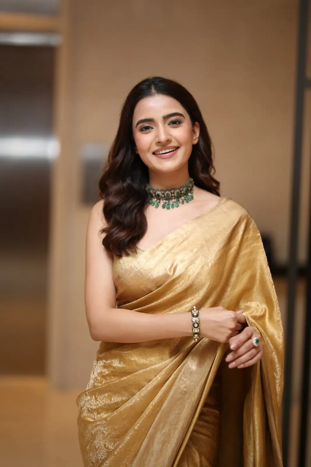 Rukshaar Dhillon Shines in Gold color Saree
