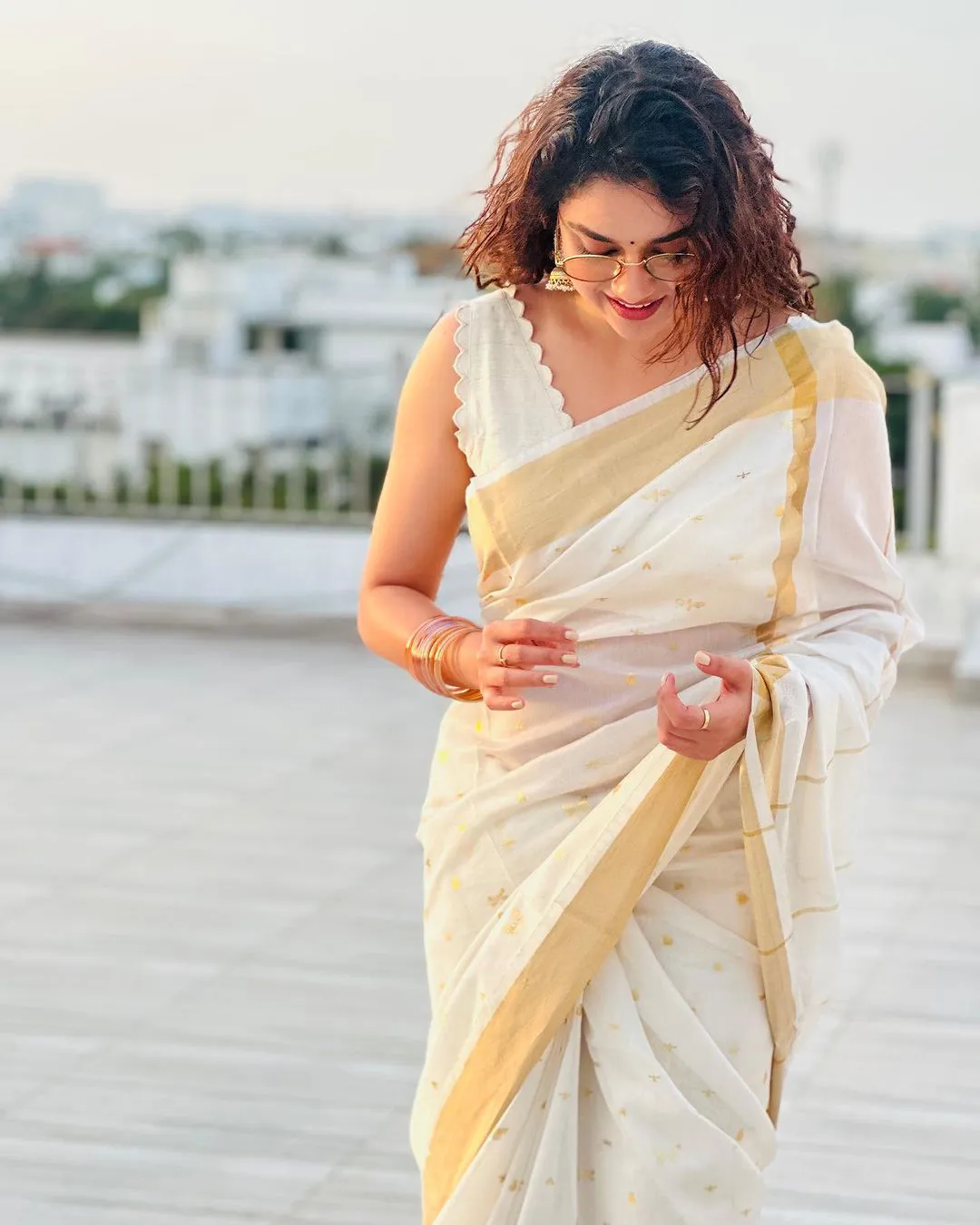 South Actress Keerthy Suresh saree photos on Onam special