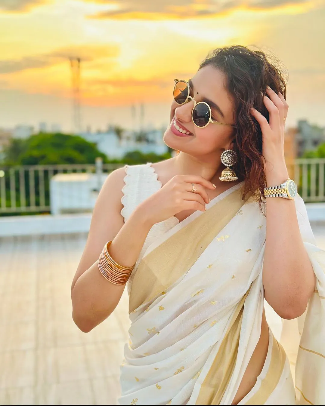 South Actress Keerthy Suresh saree photos on Onam special