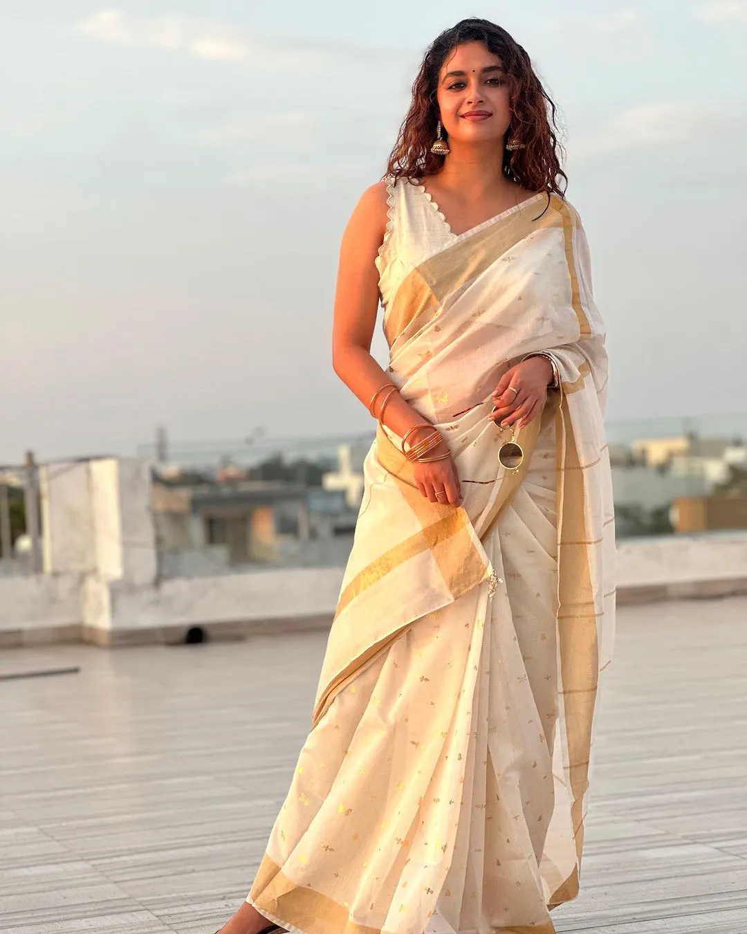 South Actress Keerthy Suresh saree photos on Onam special
