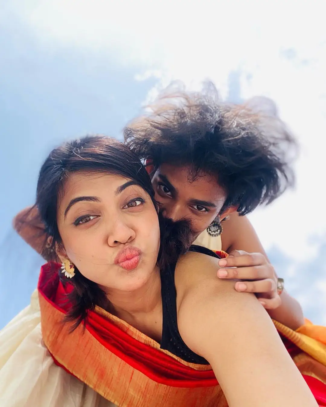 South Actress Madonna Sebastian saree photos on onam special