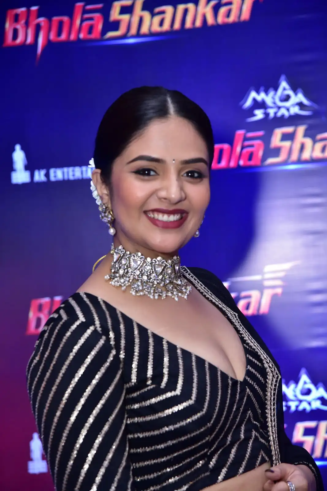 Sreemukhi clicks at Bholaa Shankar Movie Pre Release Event