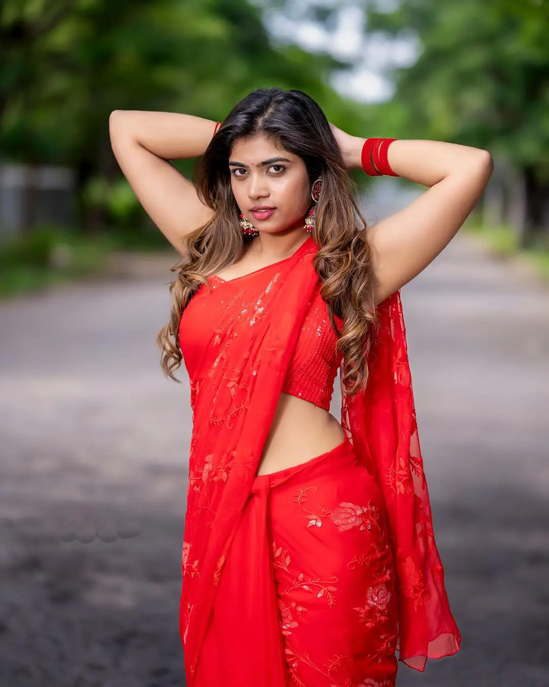 Tollywood actress Rithu Chowdary Photos in Red saree