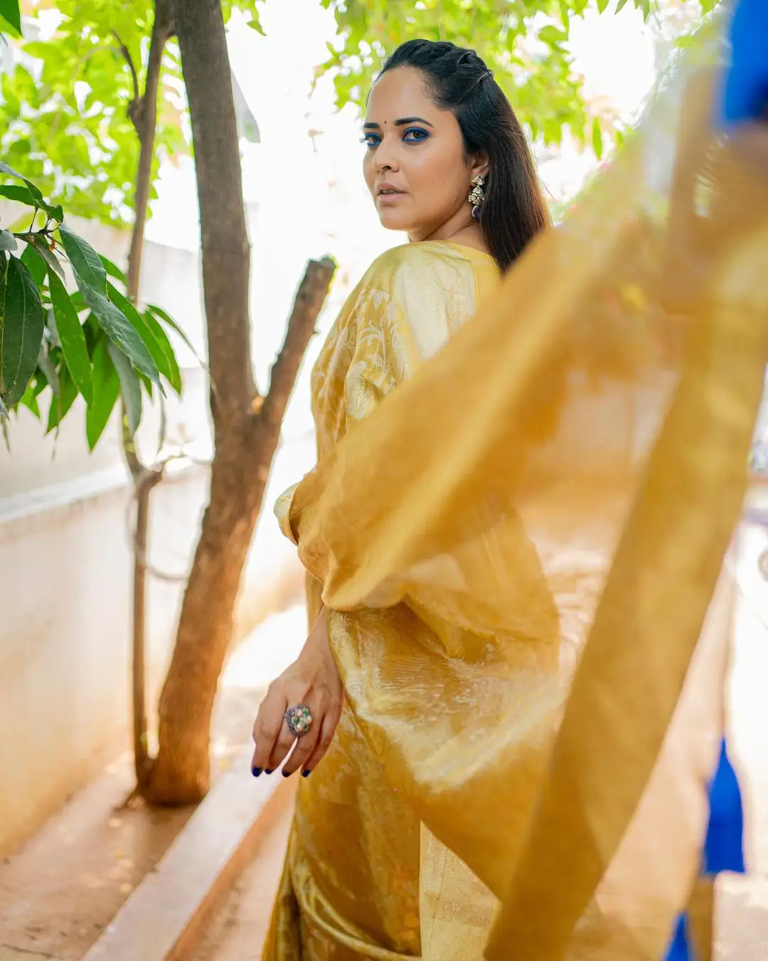 Anasuya Stunning Looks with Blue Eyes