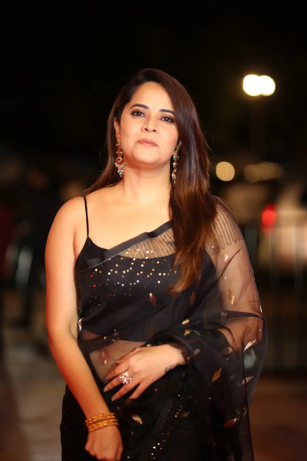 Anasuya Shines in Black Saree at Peddha Kapu 1 Pre Release Event