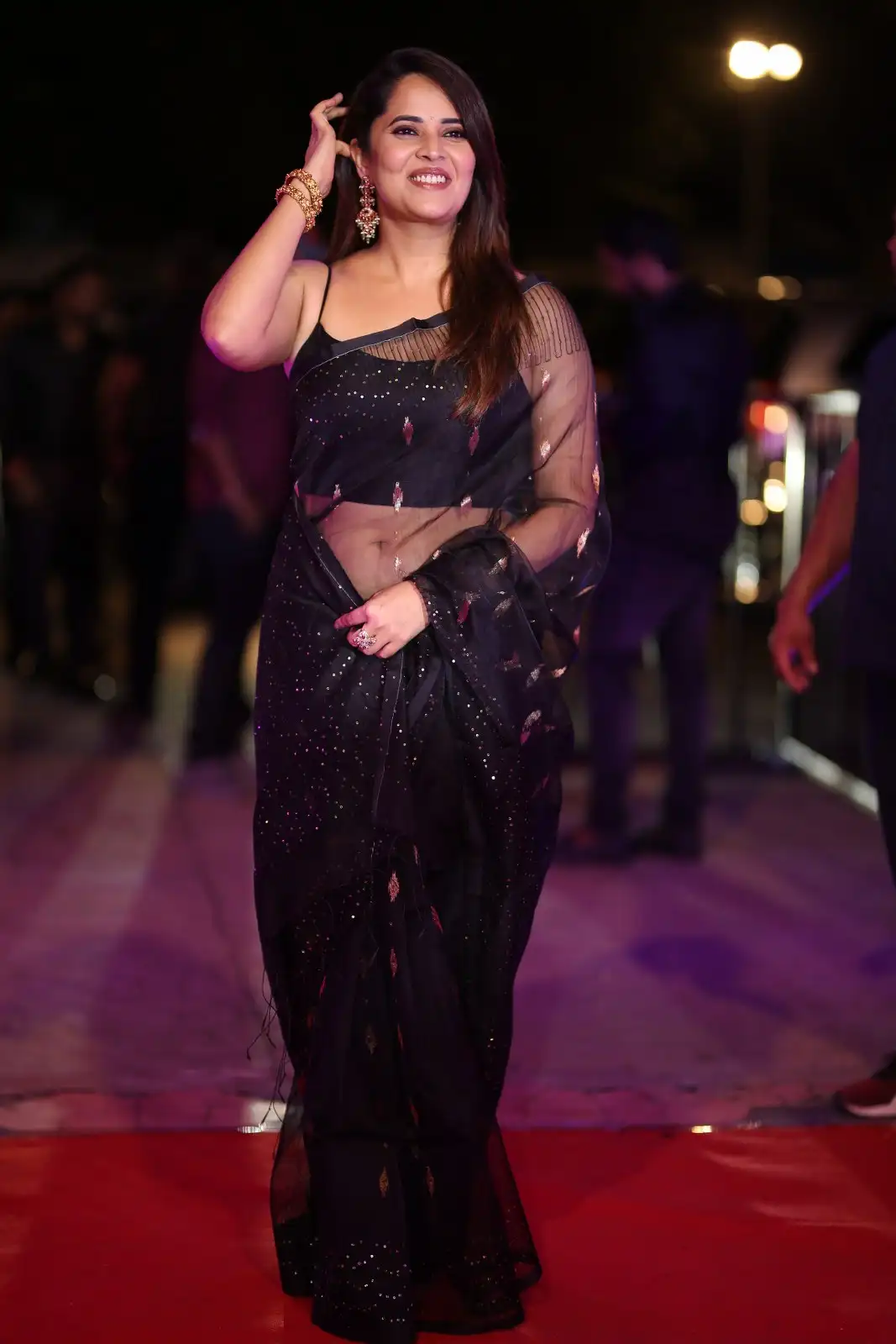 Anasuya Shines in Black Saree at Peddha Kapu 1 Pre Release Event