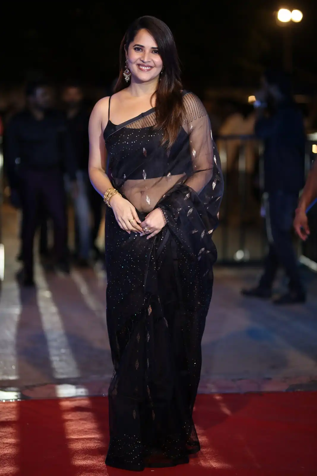 Anasuya Shines in Black Saree at Peddha Kapu 1 Pre Release Event