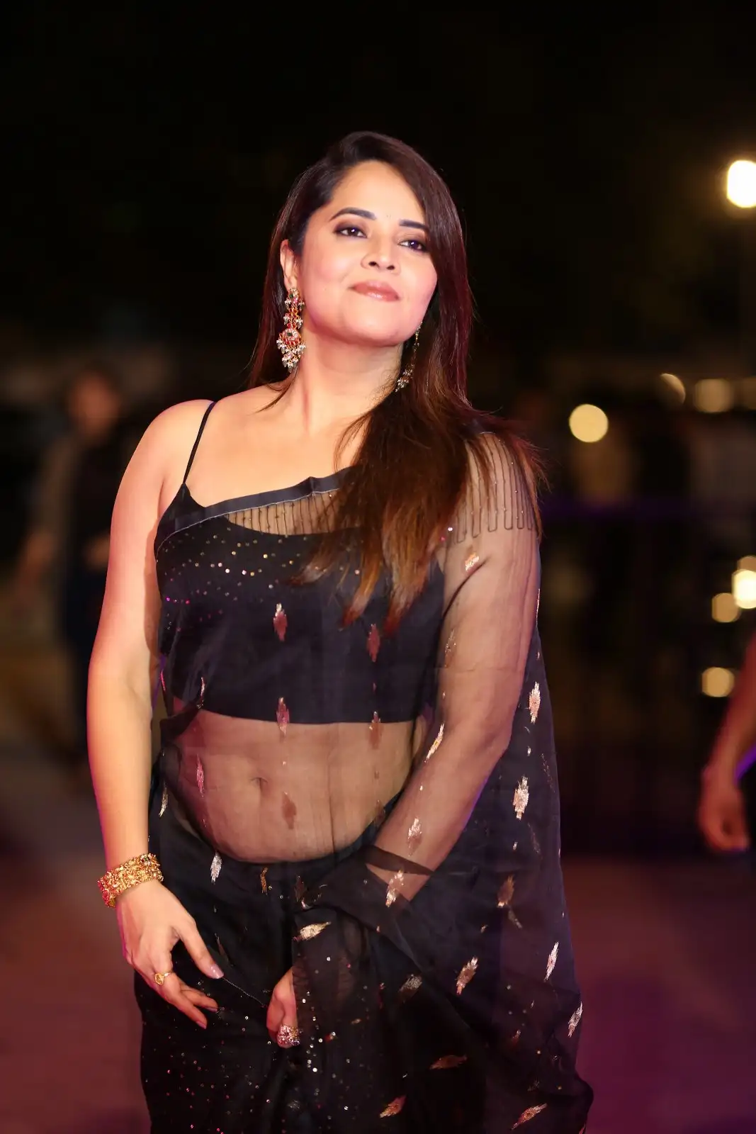 Anasuya Shines in Black Saree at Peddha Kapu 1 Pre Release Event