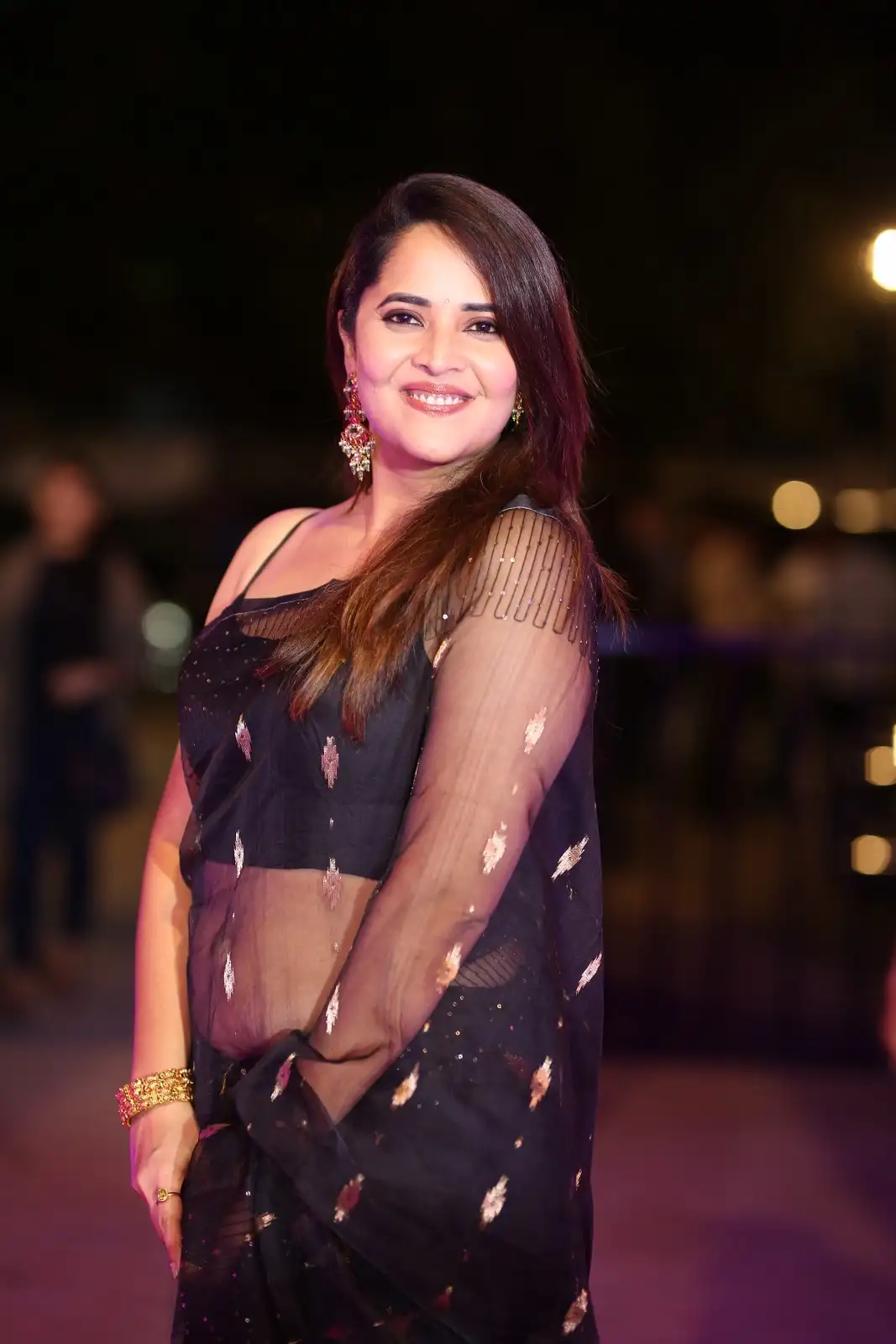 Anasuya Shines in Black Saree at Peddha Kapu 1 Pre Release Event