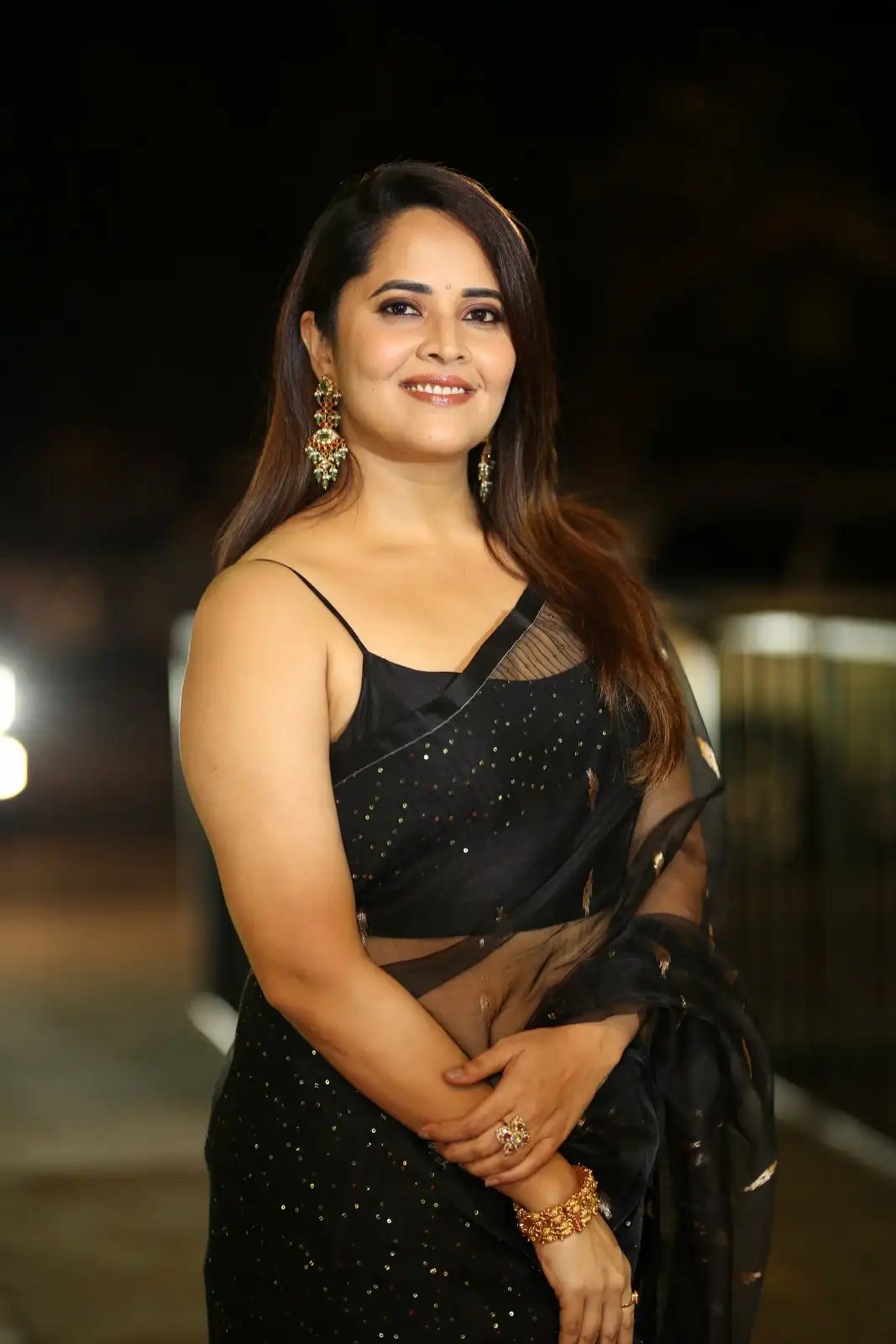 Anasuya Shines in Black Saree at Peddha Kapu 1 Pre Release Event