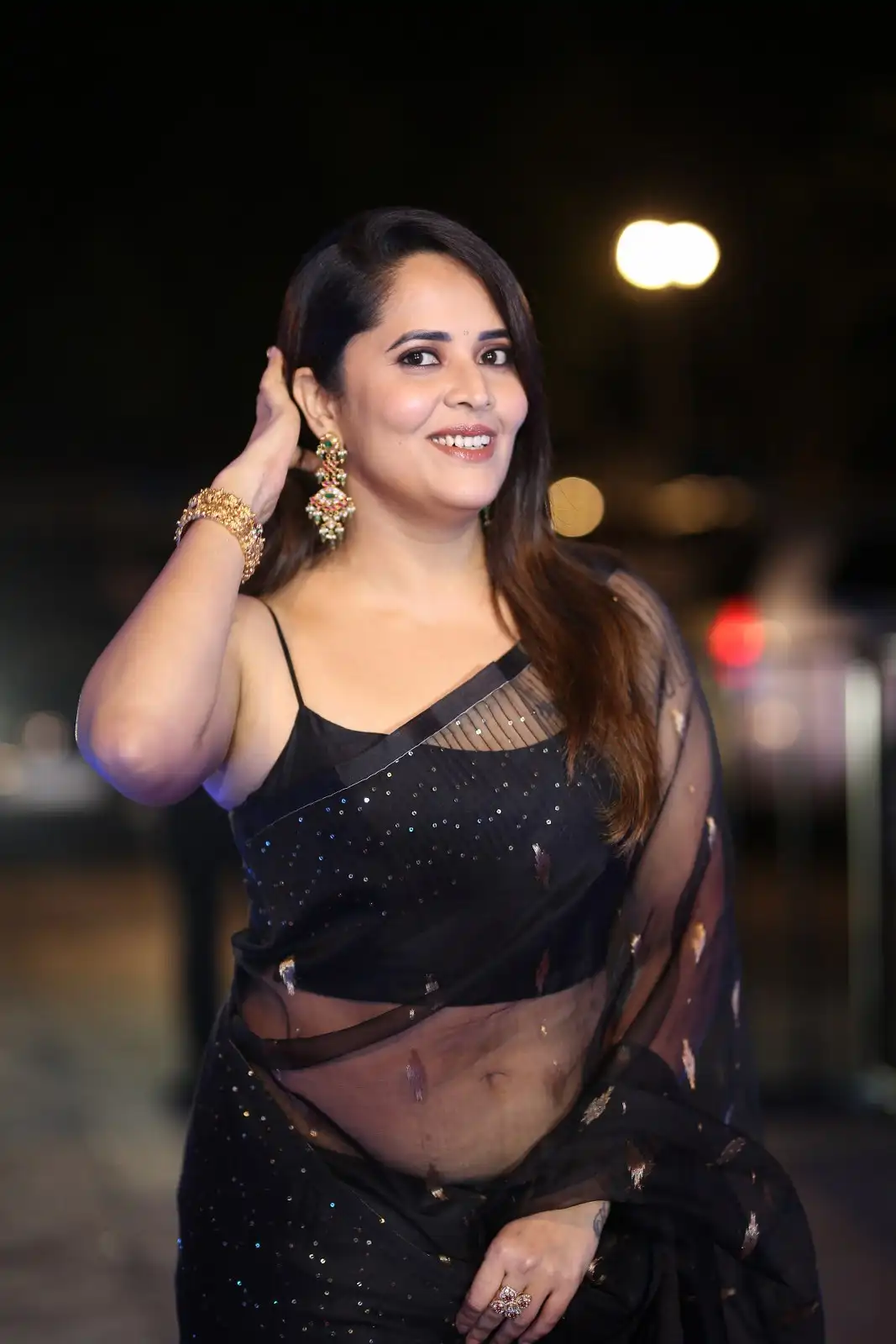 Anasuya Shines in Black Saree at Peddha Kapu 1 Pre Release Event