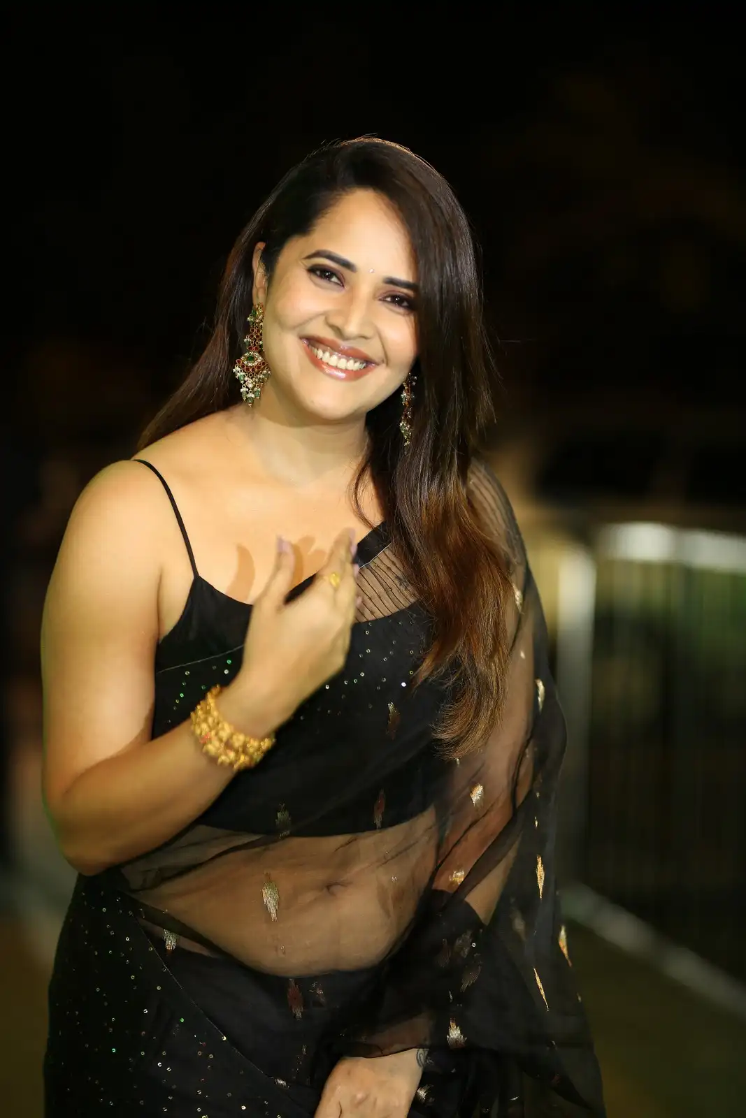 Anasuya Shines in Black Saree at Peddha Kapu 1 Pre Release Event