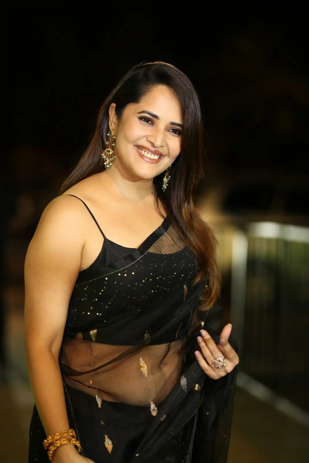Anasuya Shines in Black Saree at Peddha Kapu 1 Pre Release Event
