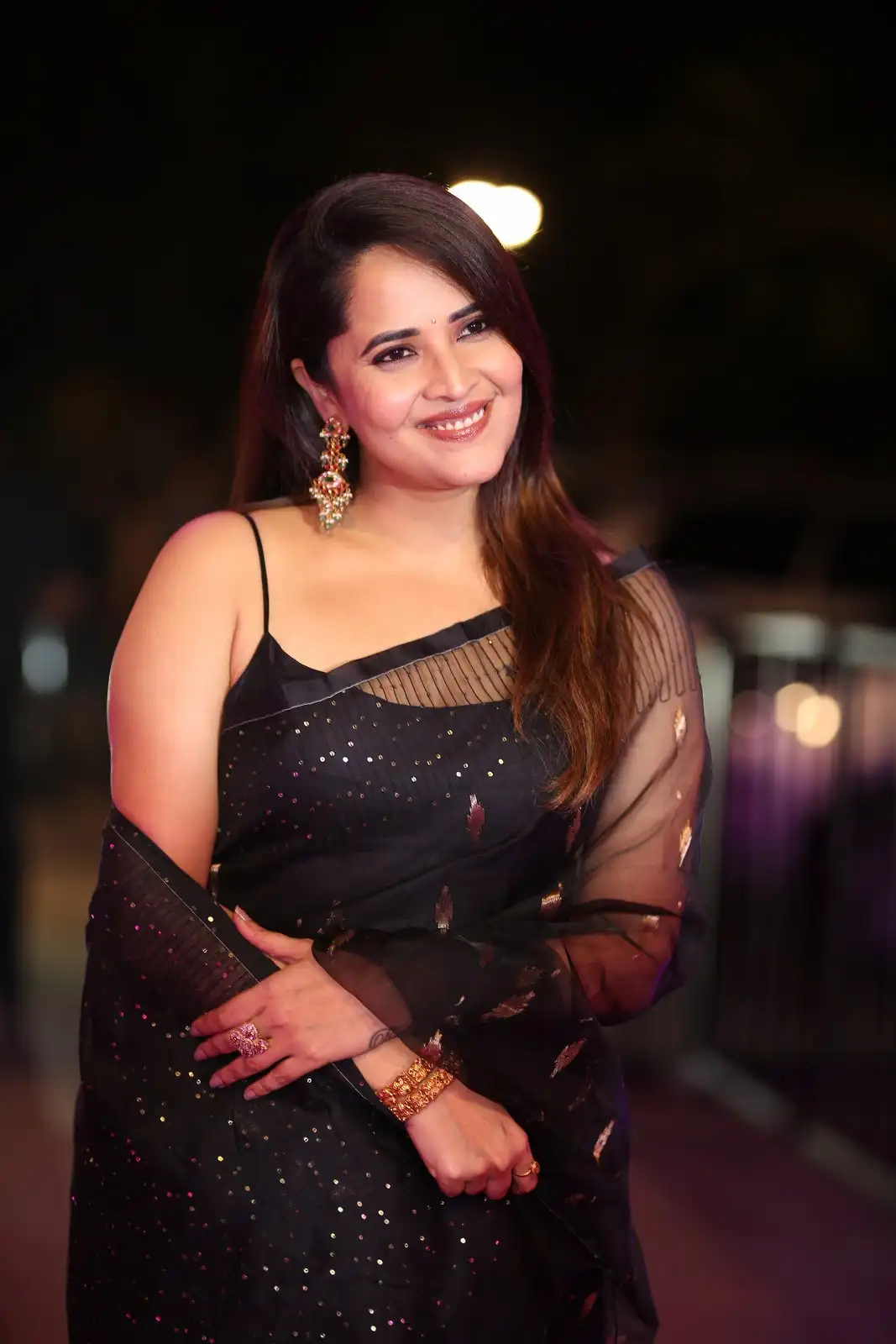 Anasuya Shines in Black Saree at Peddha Kapu 1 Pre Release Event