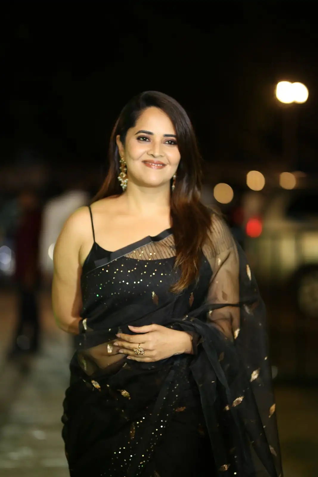 Anasuya Shines in Black Saree at Peddha Kapu 1 Pre Release Event