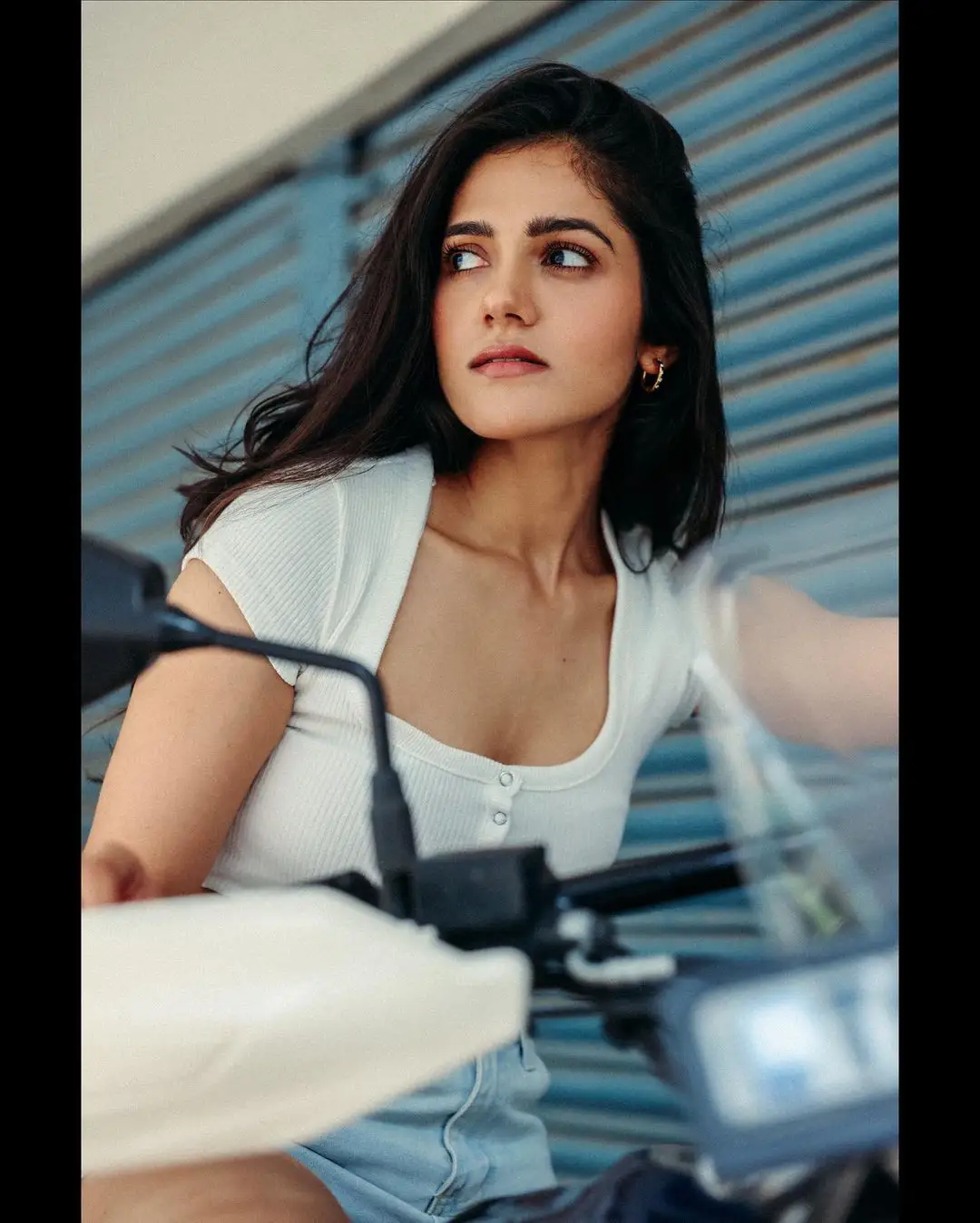 Simran Choudhary Stylish Poses on Bike with Short Dress