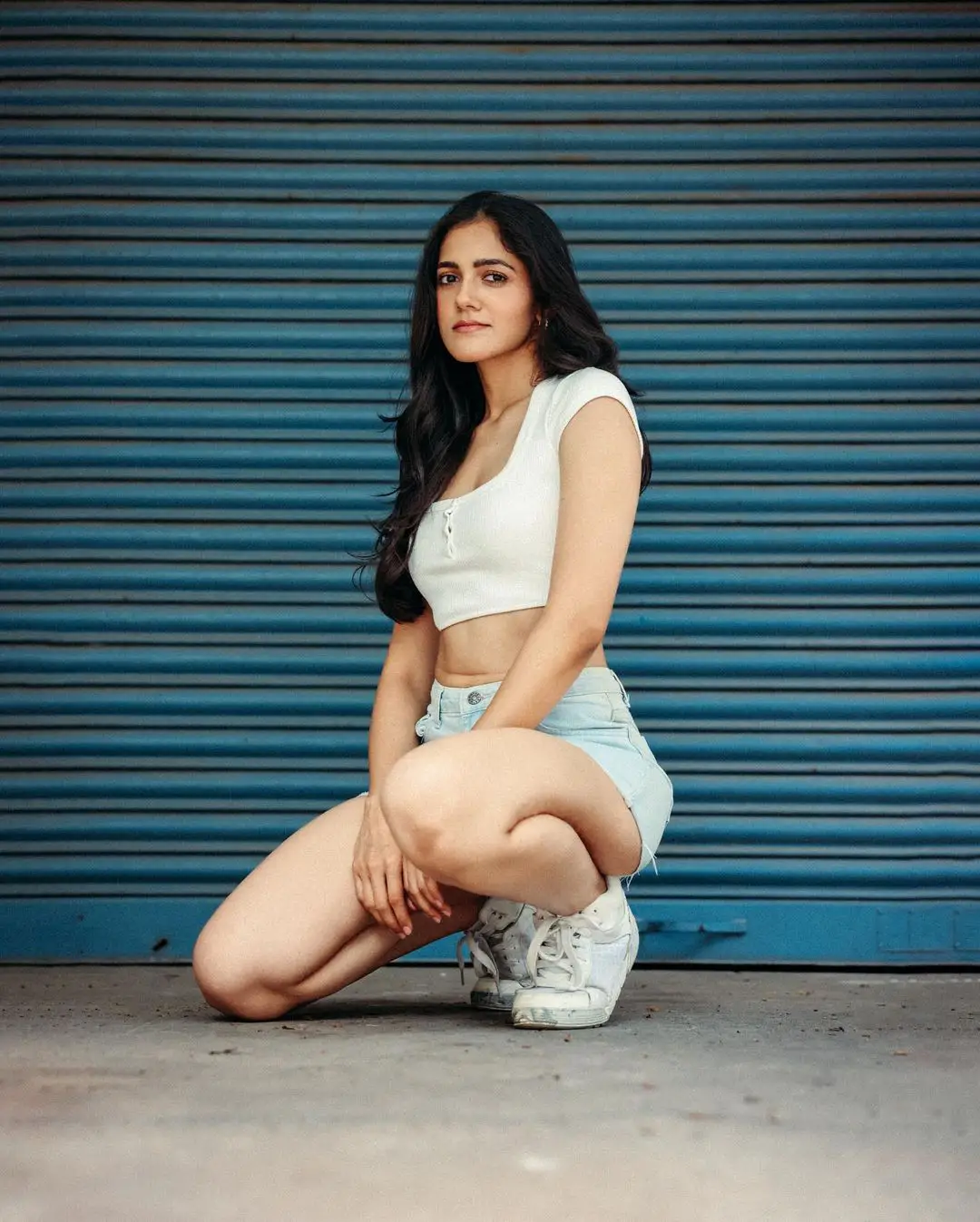 Simran Choudhary Stylish Poses on Bike with Short Dress