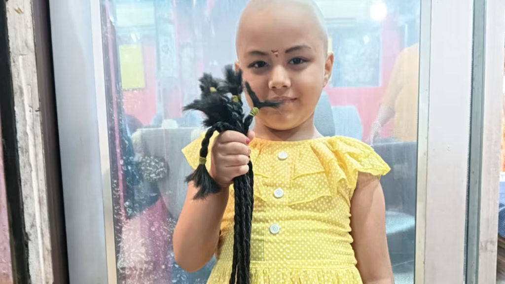 heart touching story LKG class girl donated her hair to a cancer patient in tripura
