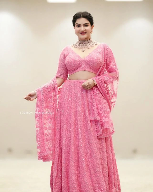 Malayala Actress Honey Rose shines in pink dress Photos