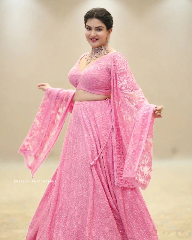 Malayala Actress Honey Rose shines in pink dress Photos