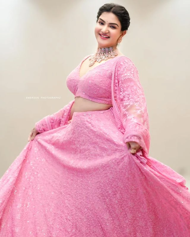 Malayala Actress Honey Rose shines in pink dress Photos