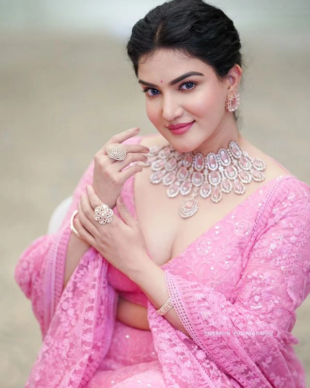 Malayala Actress Honey Rose shines in pink dress Photos