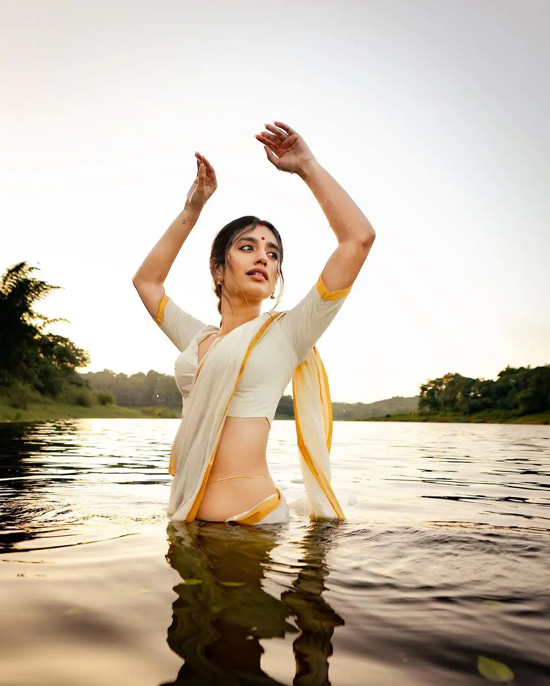 Priya Prakash Varrier Mesmerizing Saree Stills in Pond