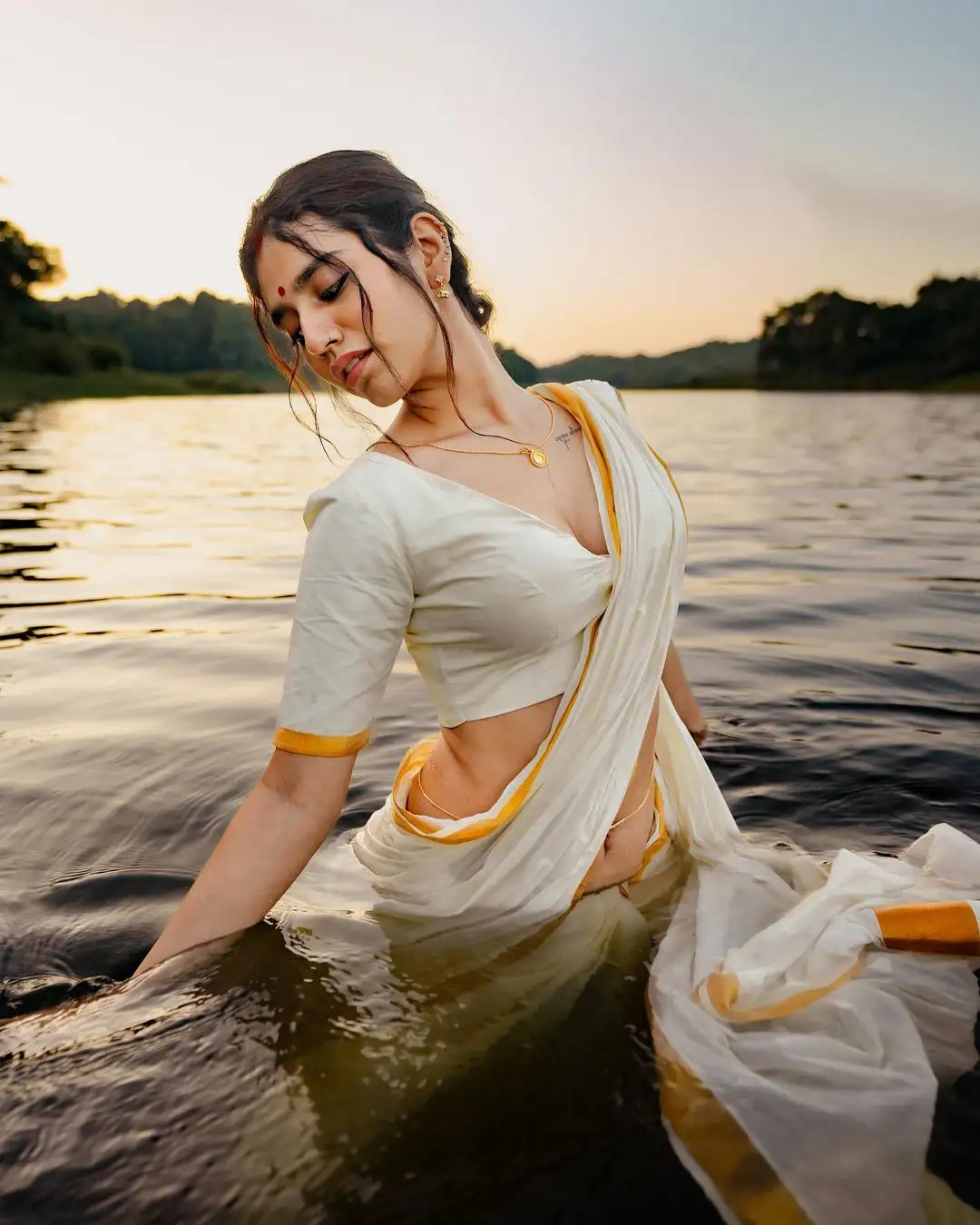 Priya Prakash Varrier Mesmerizing Saree Stills in Pond