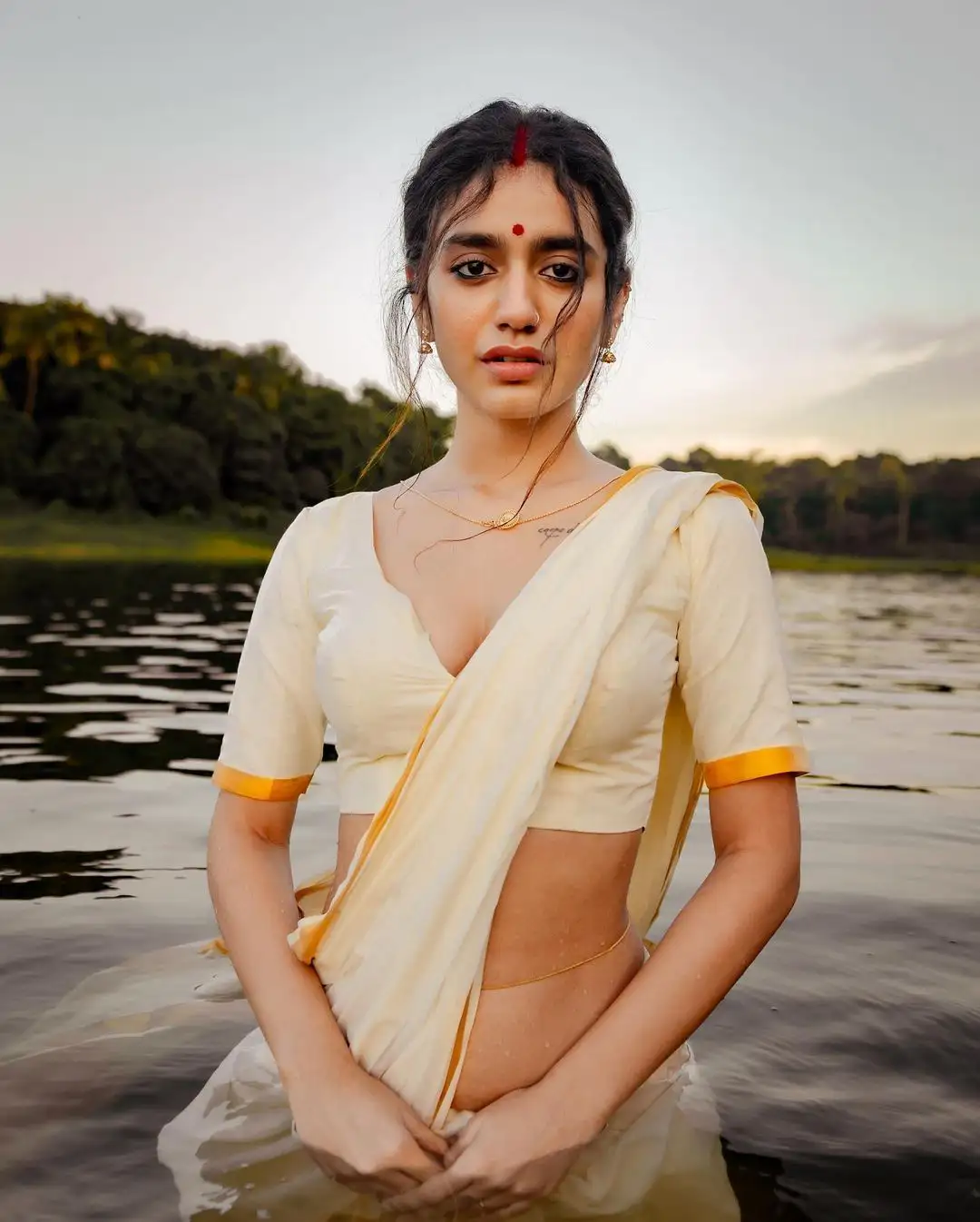 Priya Prakash Varrier Mesmerizing Saree Stills in Pond
