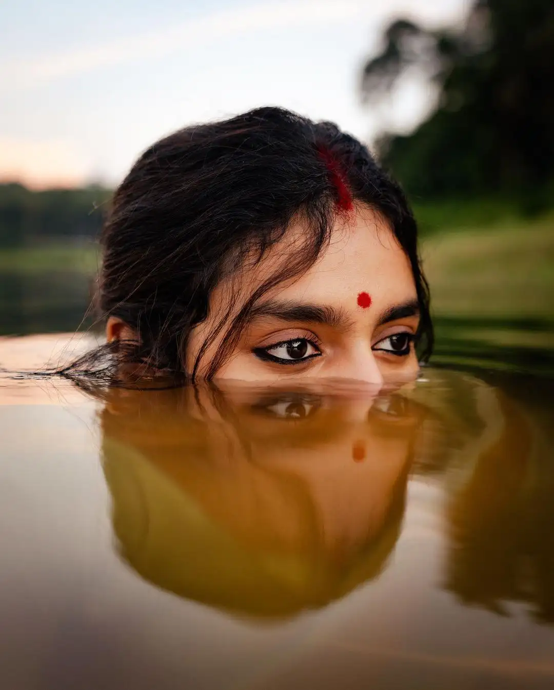 Priya Prakash Varrier Mesmerizing Saree Stills in Pond